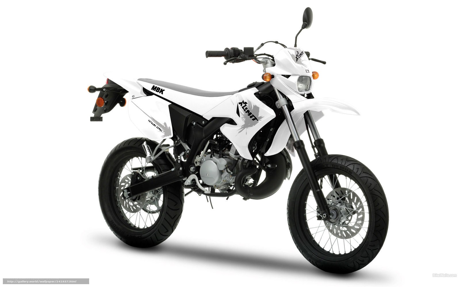 white dirt bike motorcycle
