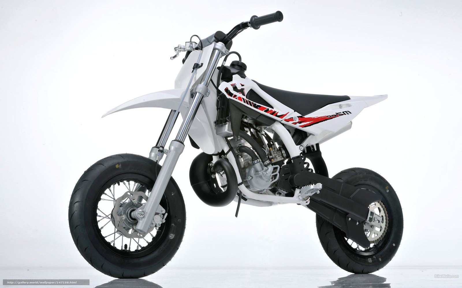 white dirt bike motorcycle