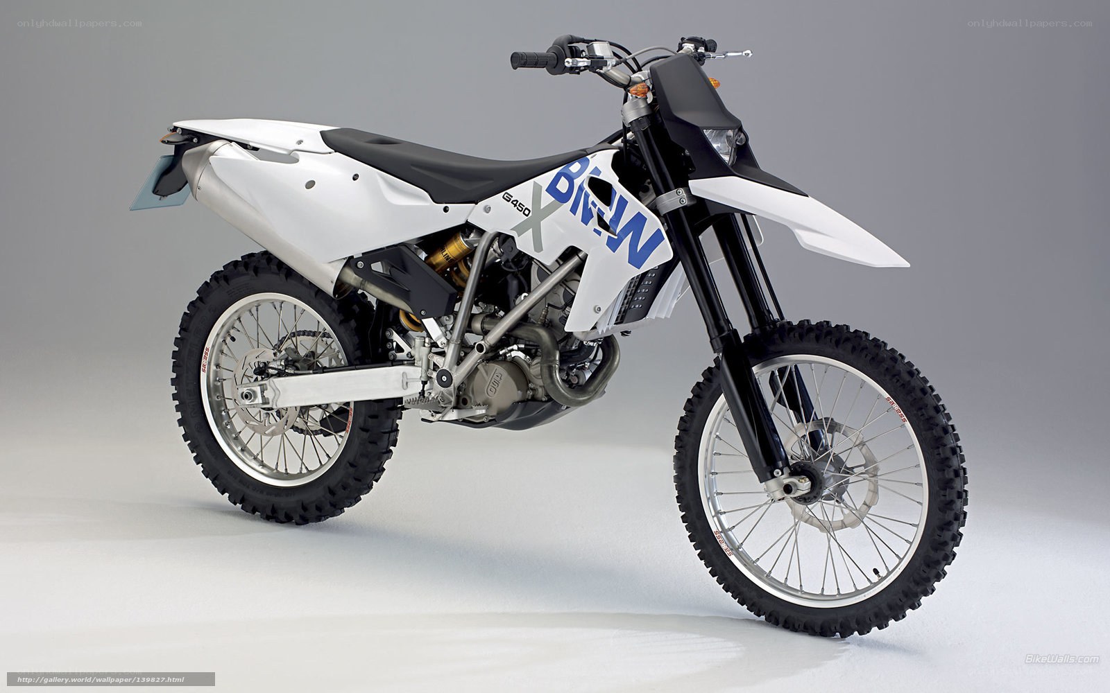 white dirt bike motorcycle