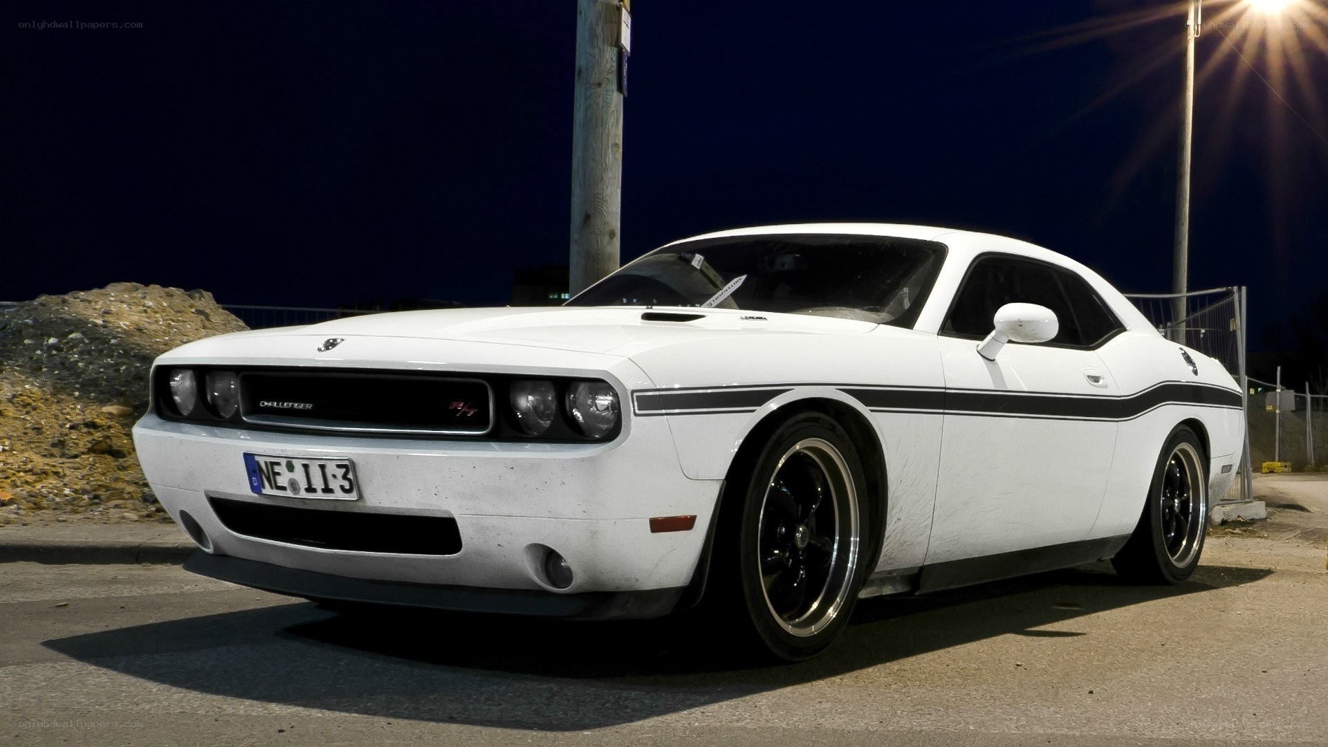 White Dodge Challenger at night
