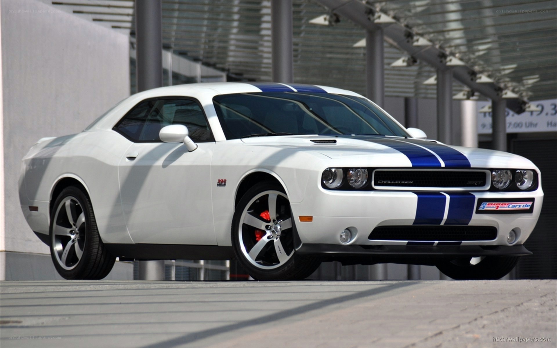 white dodge challenger with blue stripes