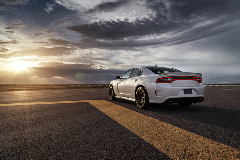 White Dodge Charger on a desert road