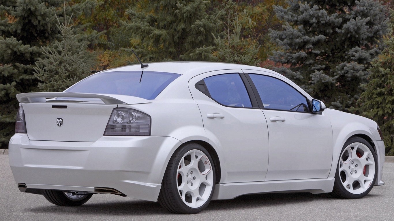white dodge sedan with spoiler