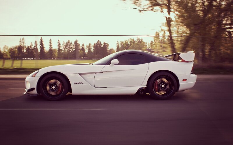 white dodge viper in motion