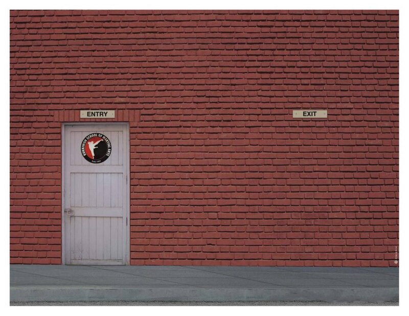 White Door on Brick Wall