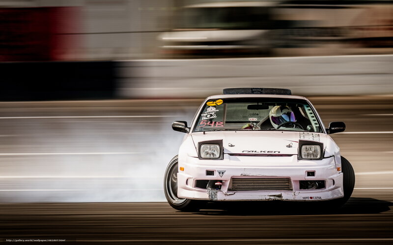 White drift car in action