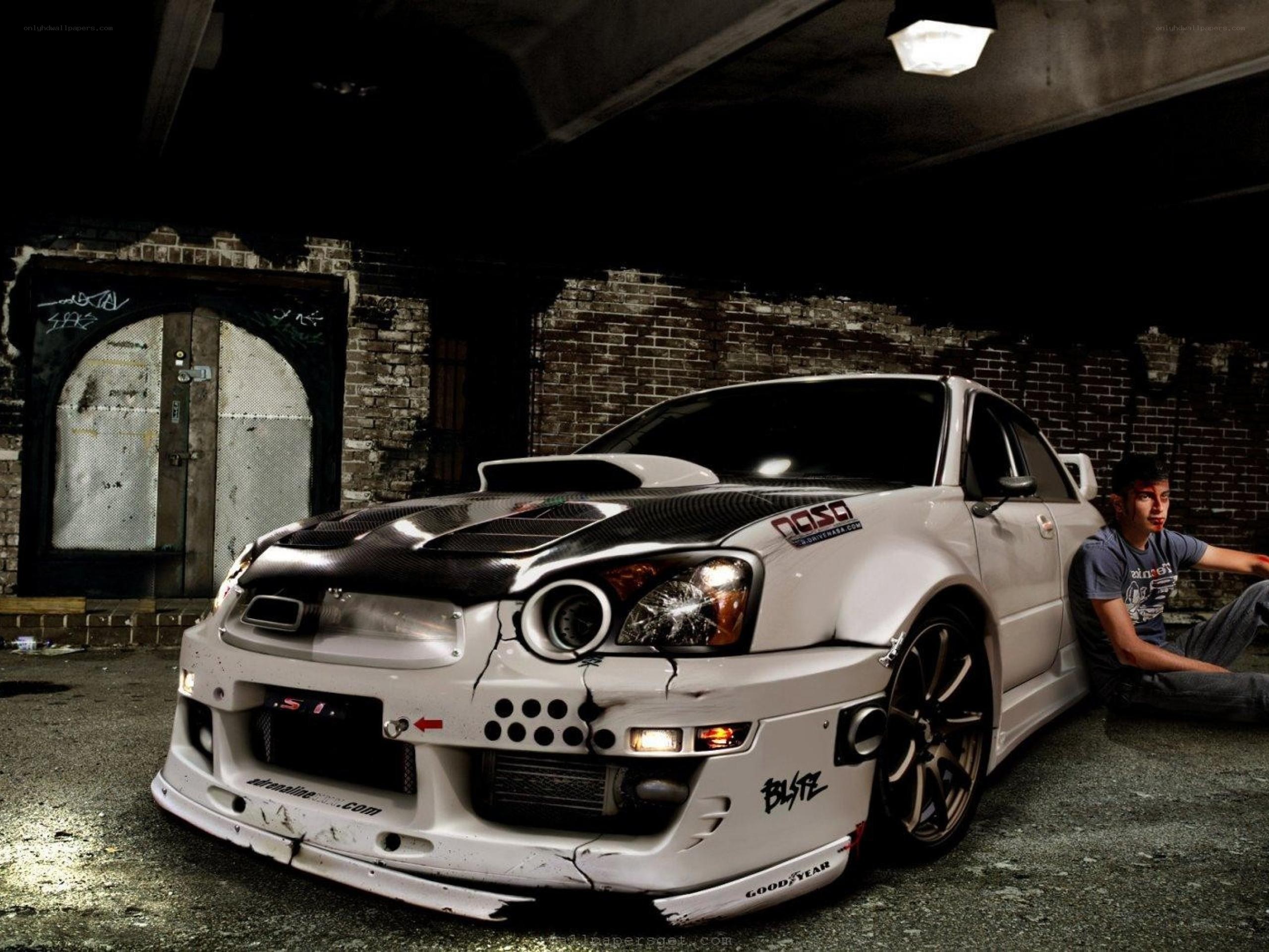 white drift car in garage
