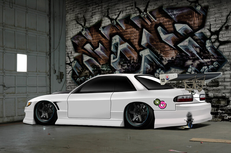 white drift car in garage
