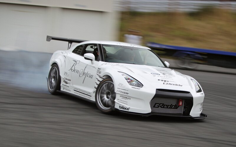 white drift car in motion