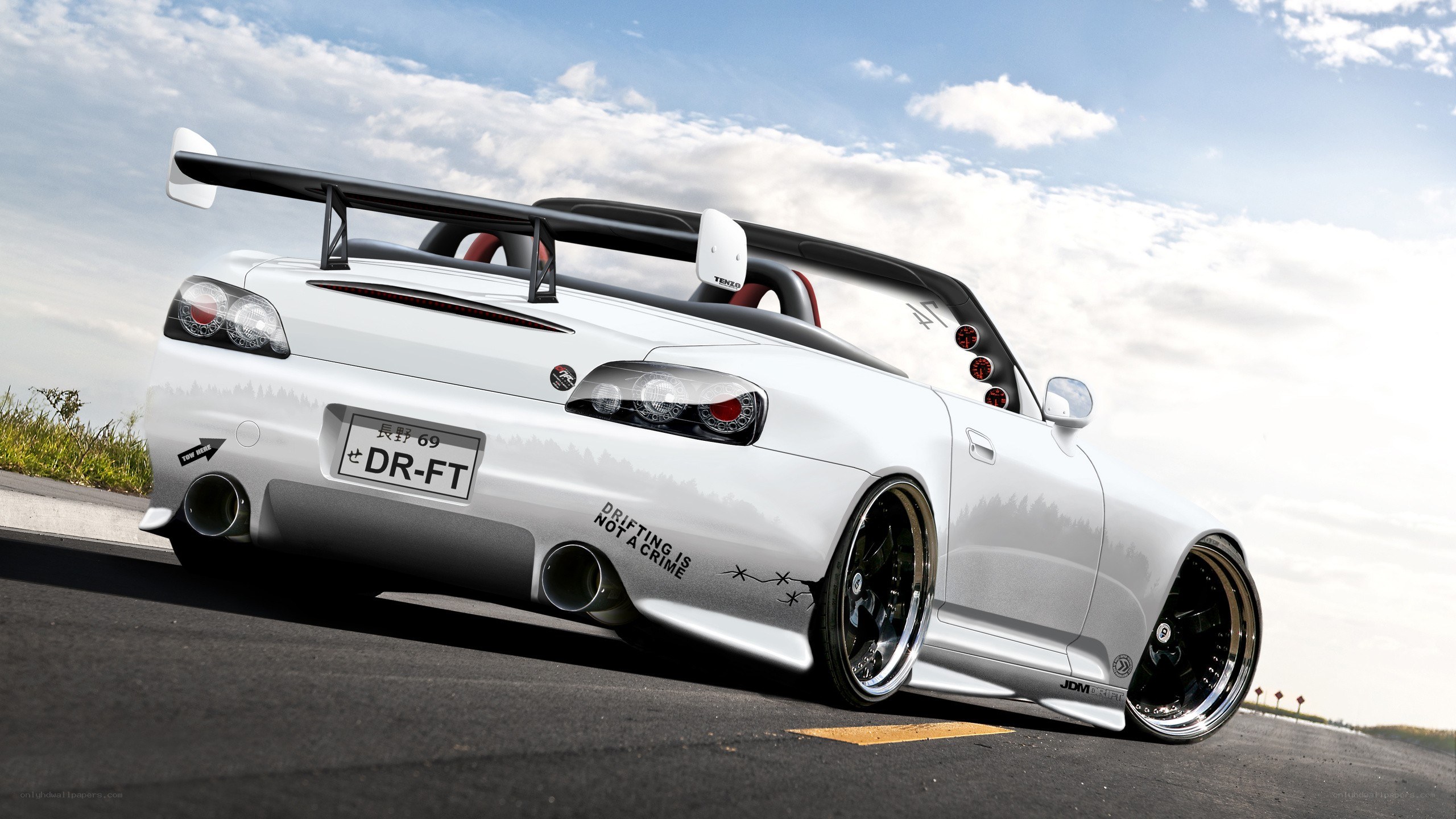 white drift car on road