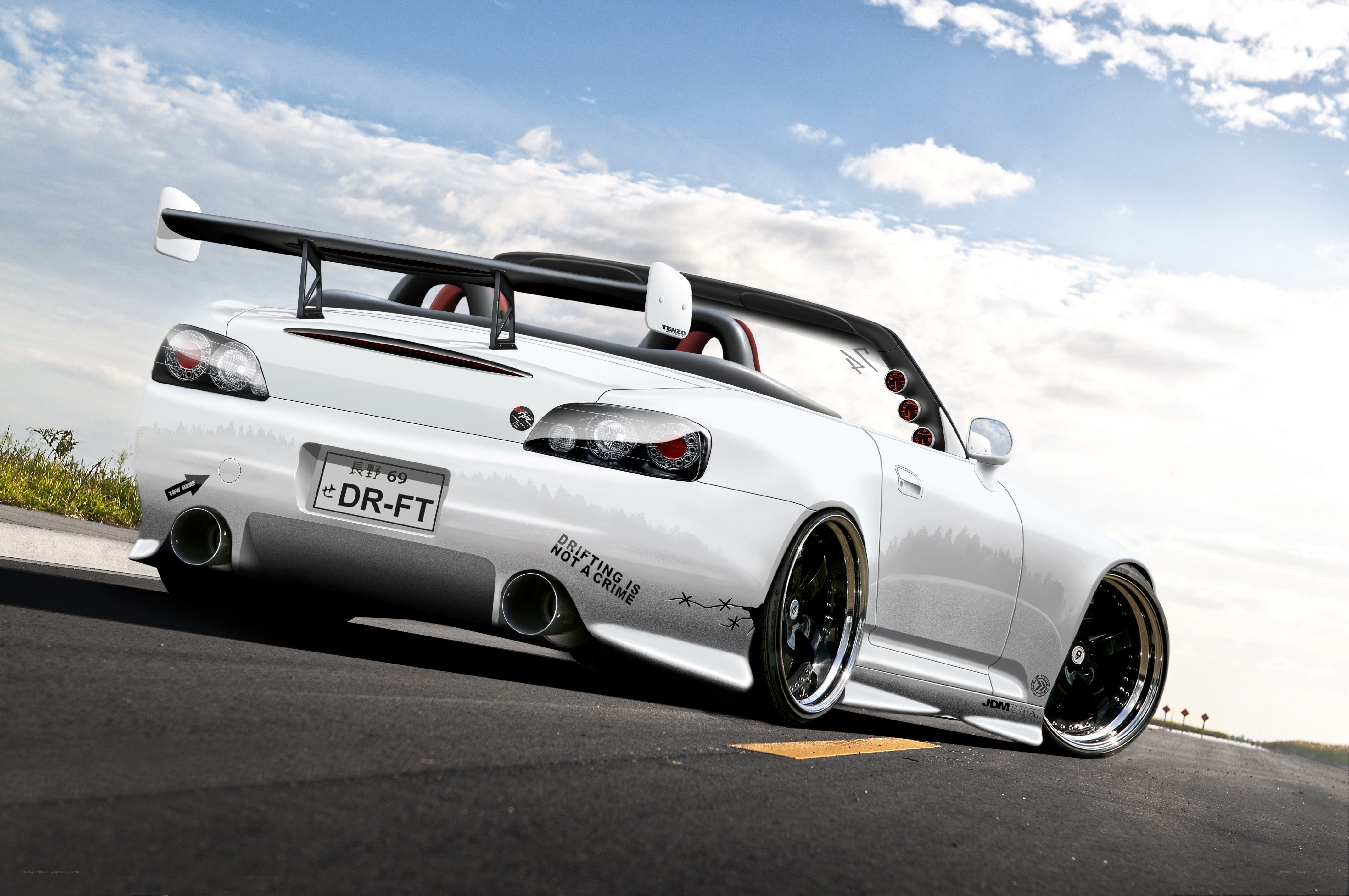 white drift car on road