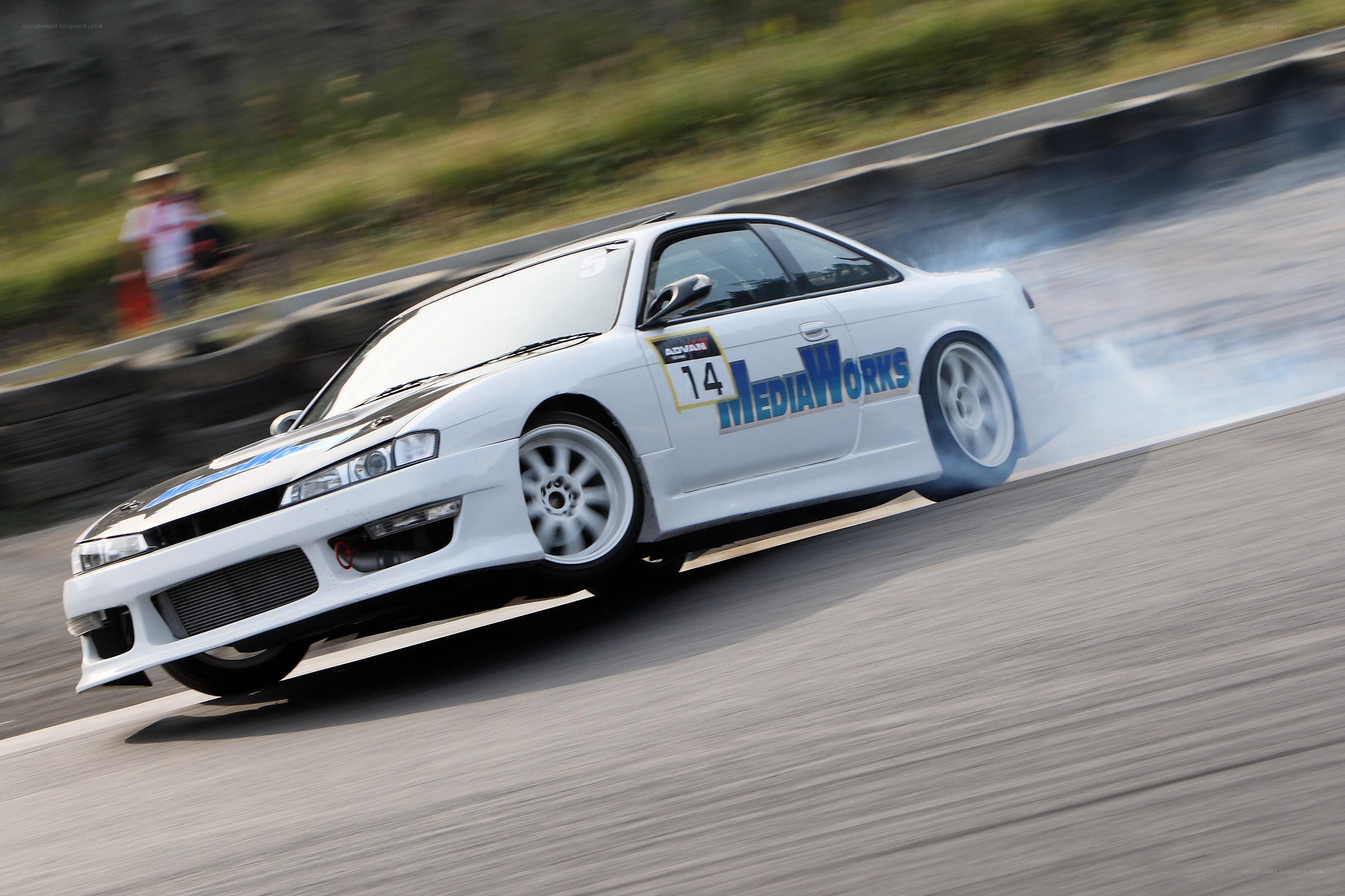 White drift car on track
