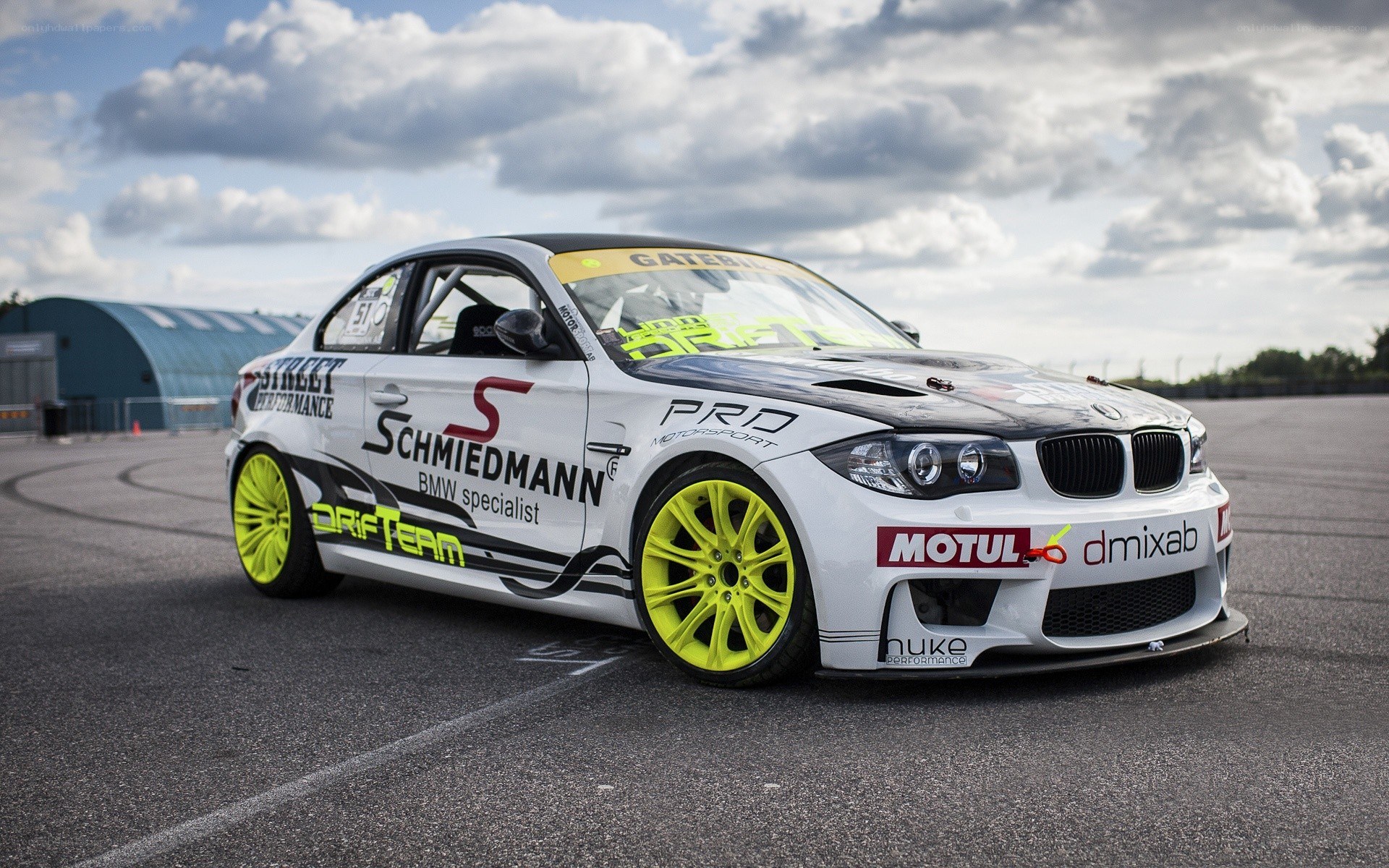 white drift car on track