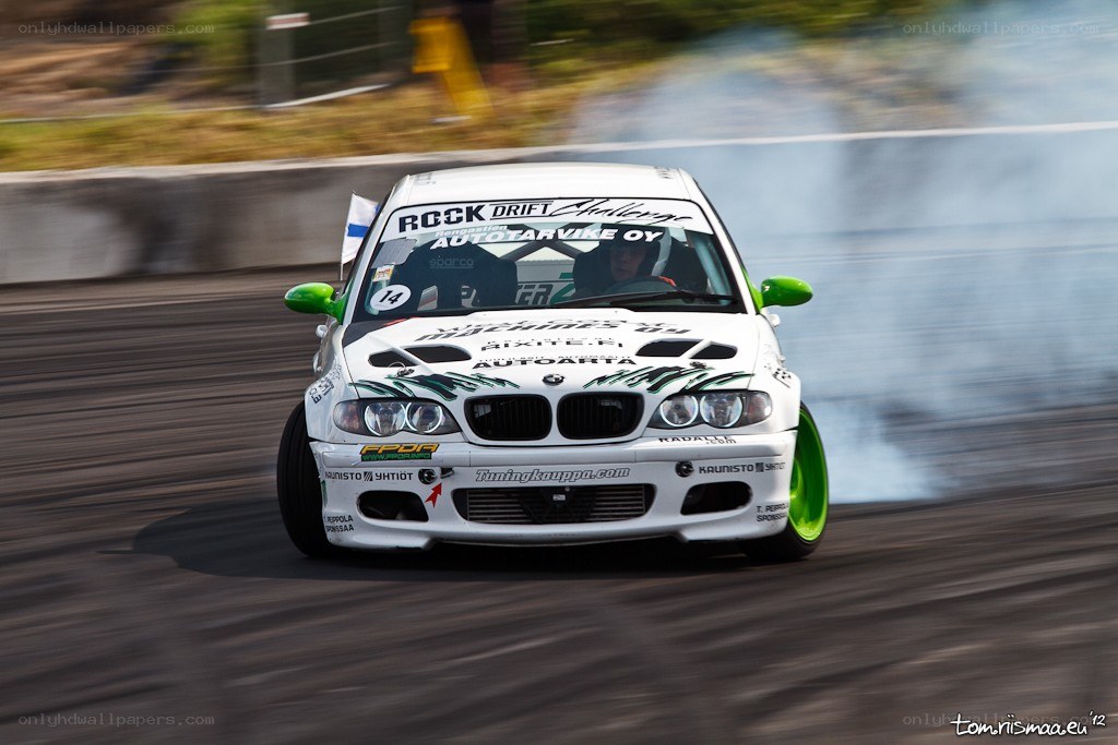 White drift car on track
