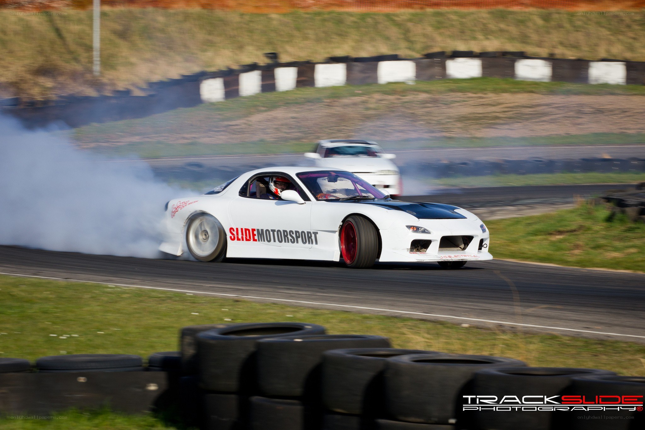 White drift car on track