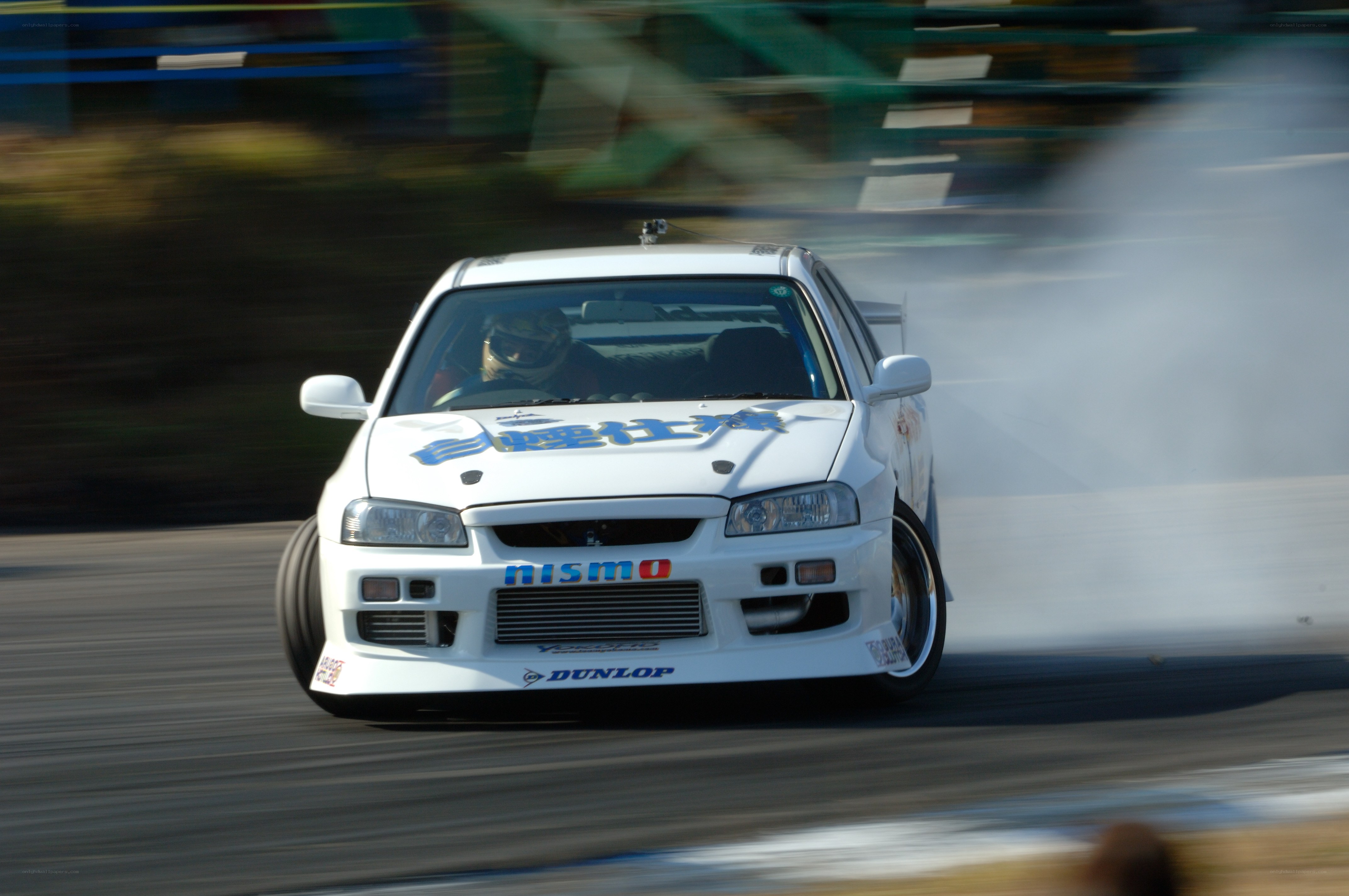 White drift car on track