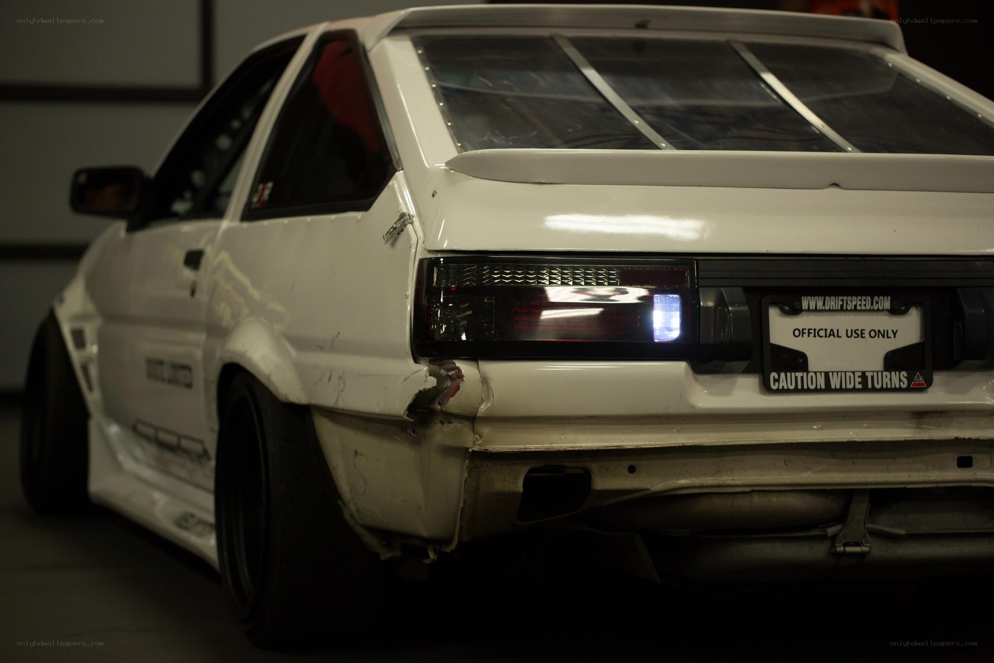 white drift car rear view