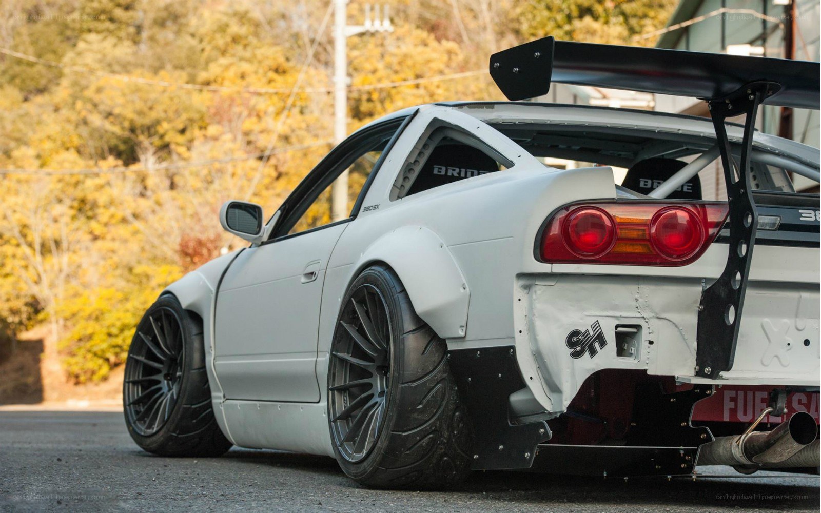 white drift car with rear wing