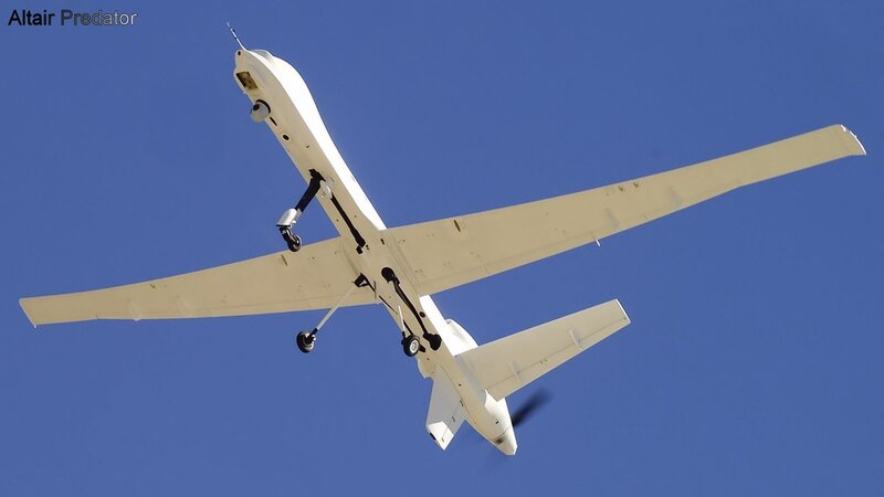 White Drone in Flight