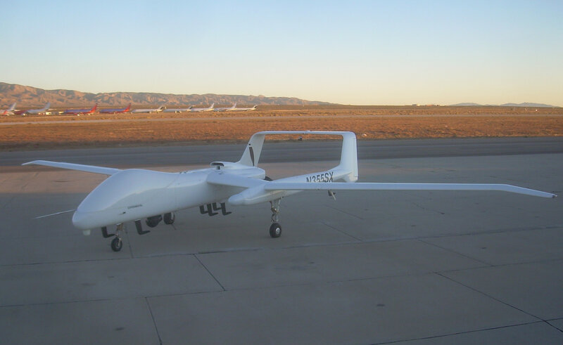 White drone on tarmac