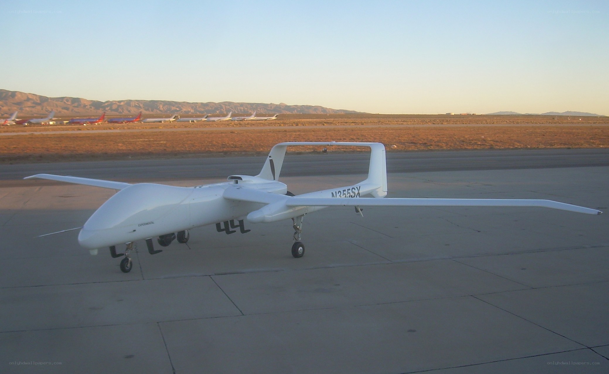 White drone on tarmac