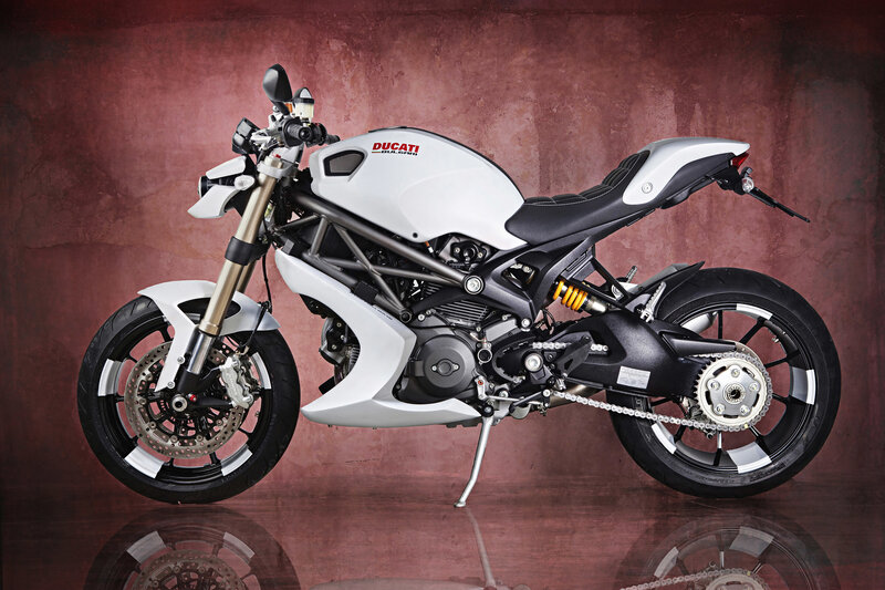 White Ducati Motorcycle — Dramatic, Photograph, Seat