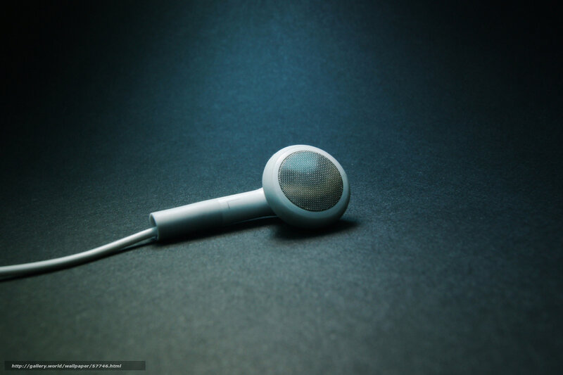white earbud on dark surface