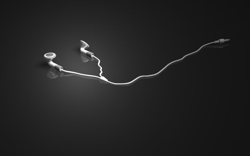White Earbuds on Black — Minimalist