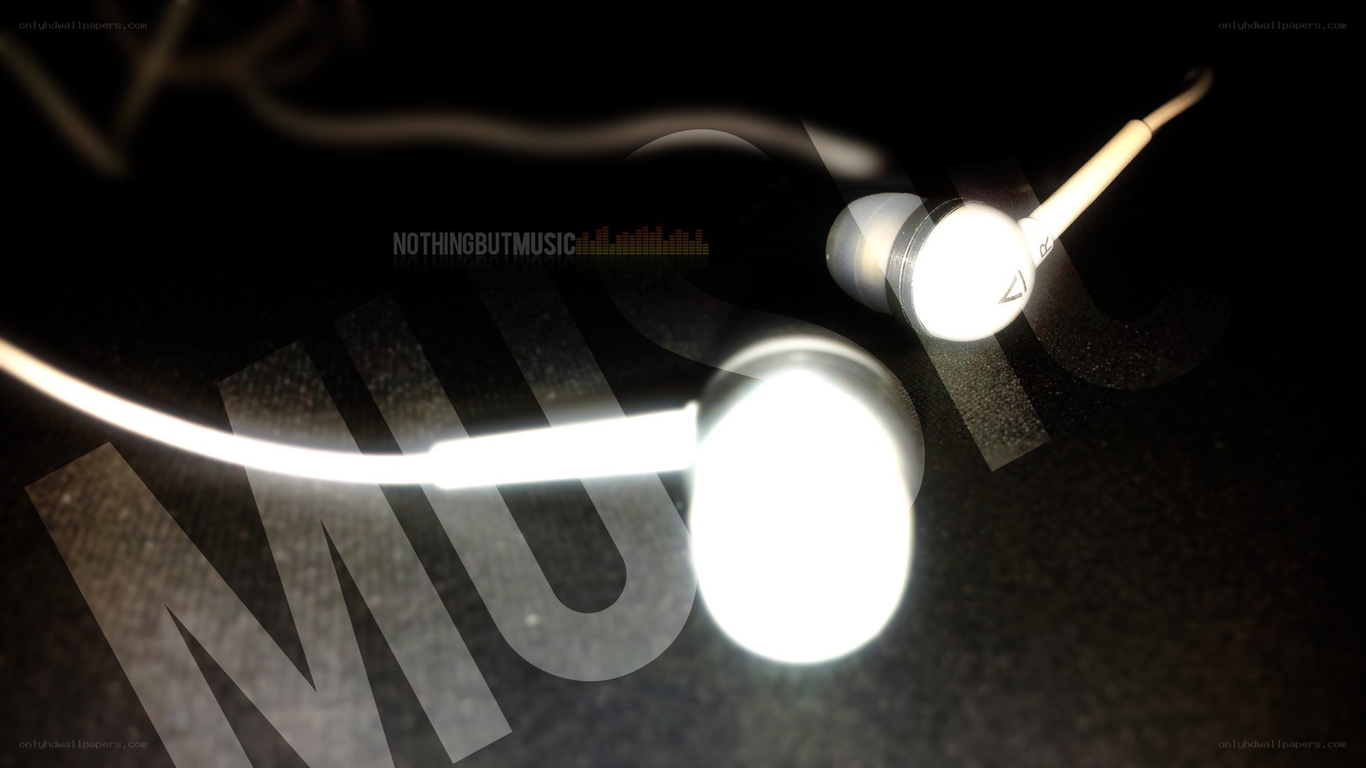 white earbuds on dark surface