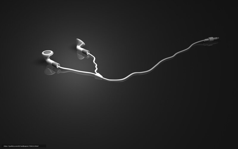White earbuds on dark surface