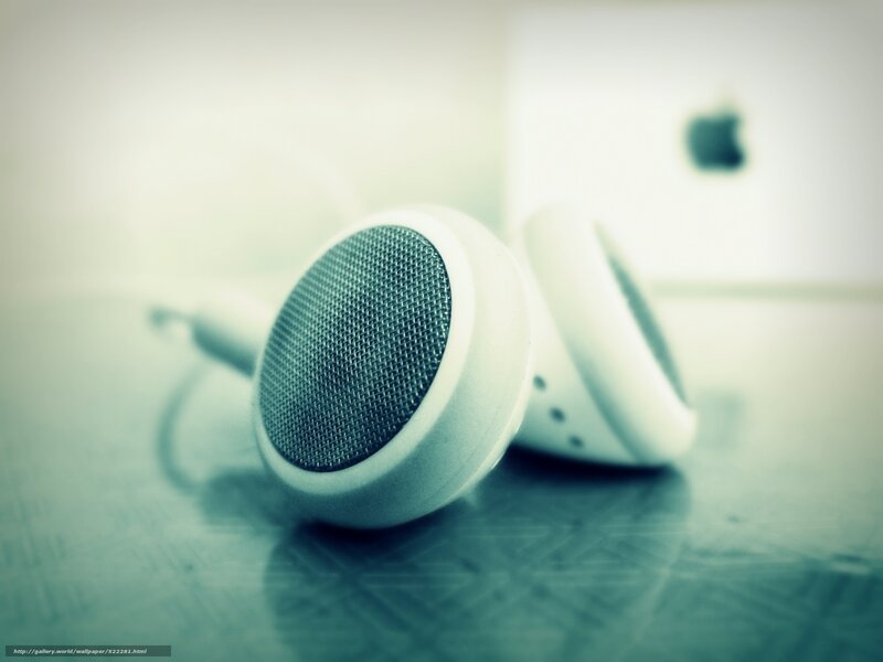 white earbuds on table