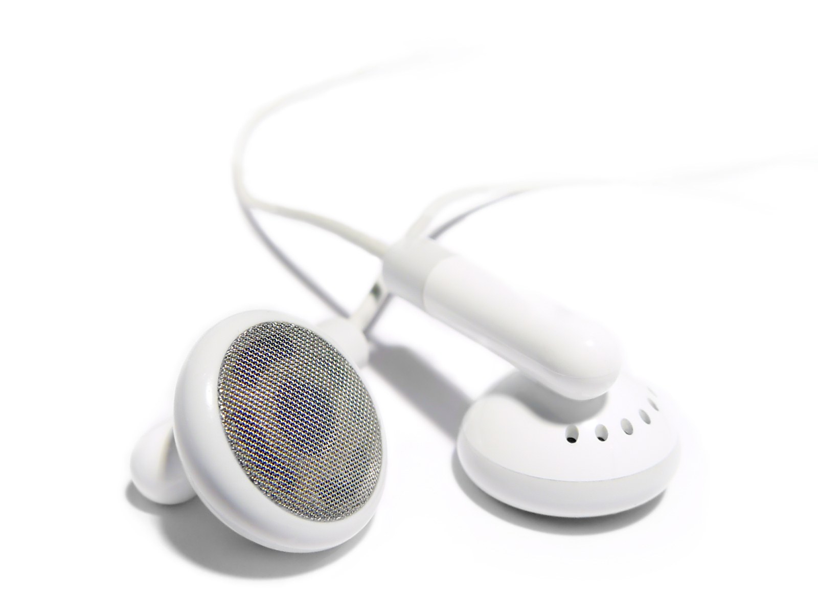 white earbuds on white background