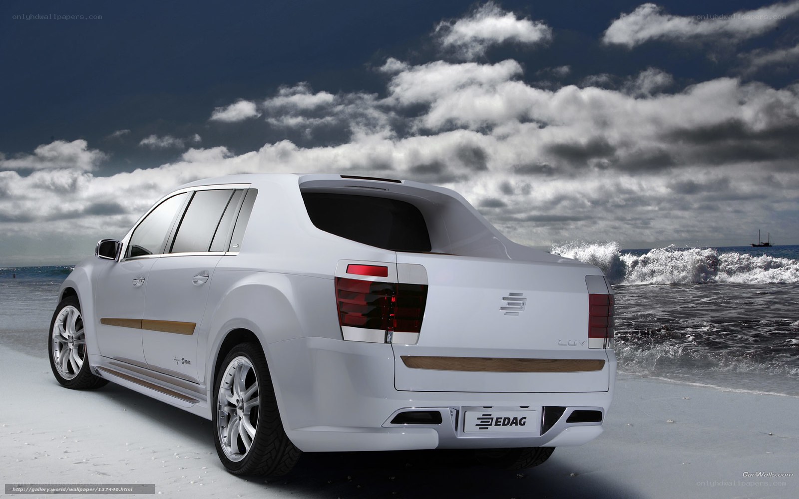 White Edag CUV on beach