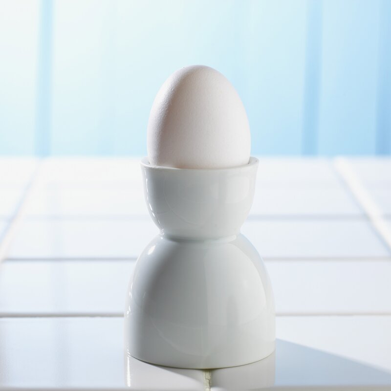 White egg in a white holder