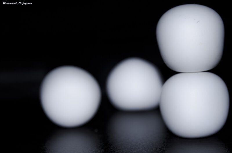 White Eggs on Black Surface