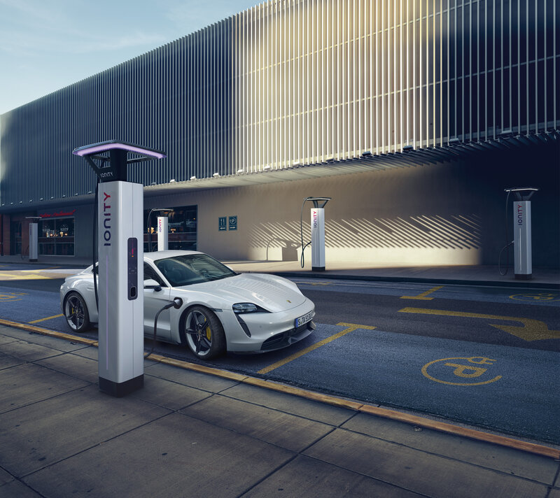 White Electric Car Charging — Dramatic