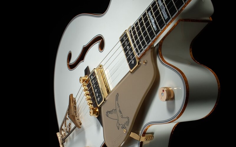 White Electric Guitar — Dramatic, Photograph, Eagle Logo