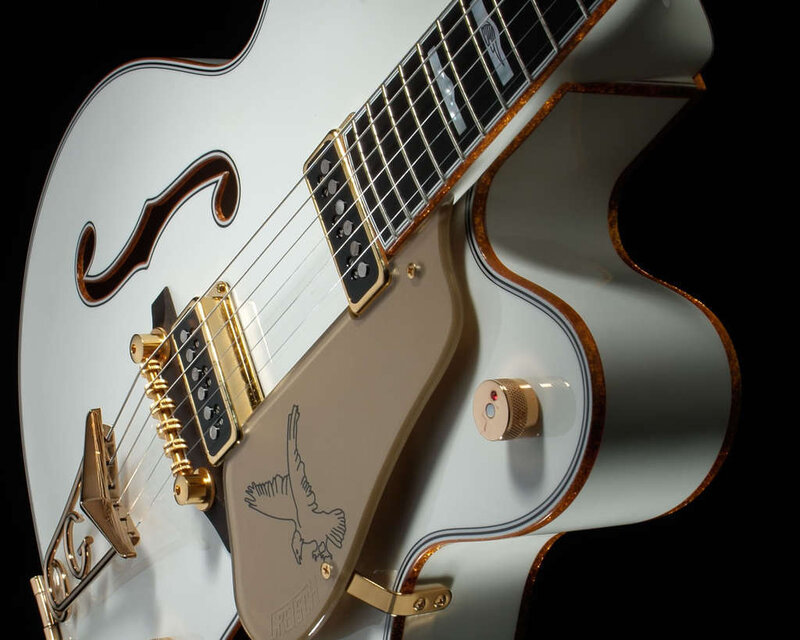 White Electric Guitar — Dramatic, Photograph, F-holes, Gold Hardware