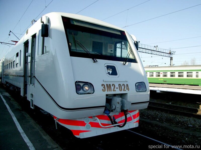 White electric train at station