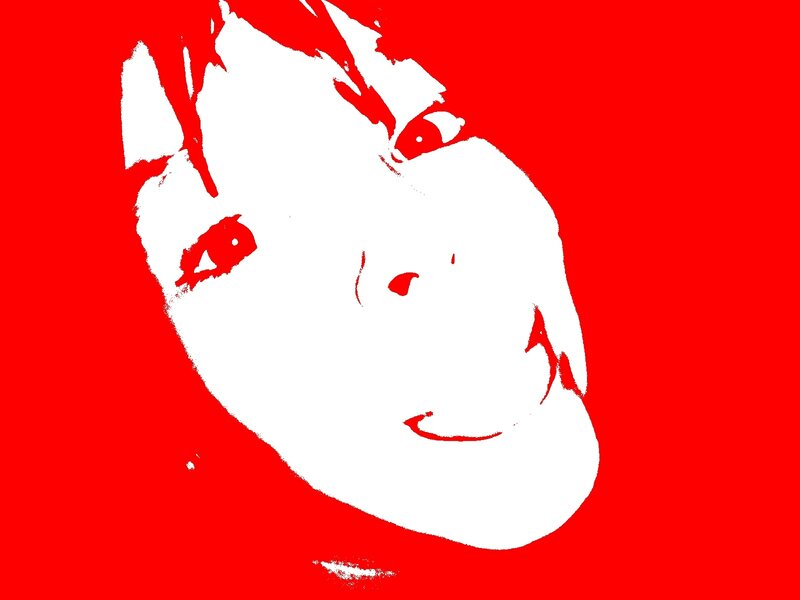 white face on red background
