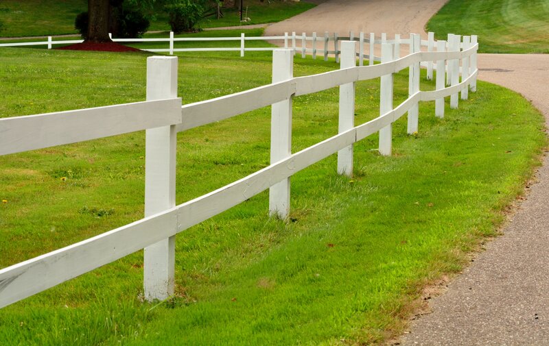 White Fence Along Road