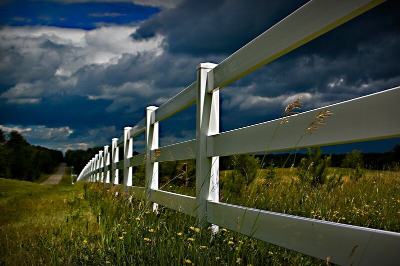 White Fence in Field — Green, Dramatic