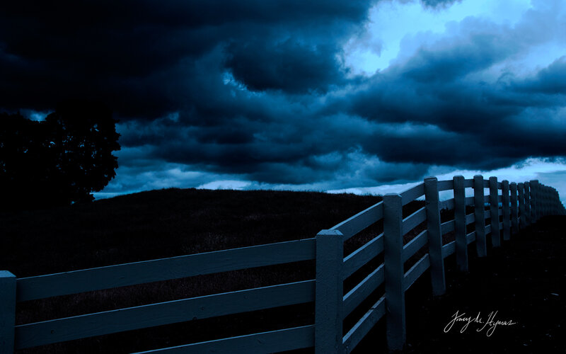 White Fence on Hill