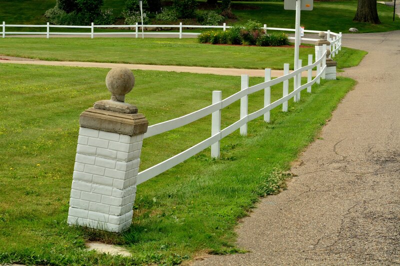 White Fence with Brick Posts