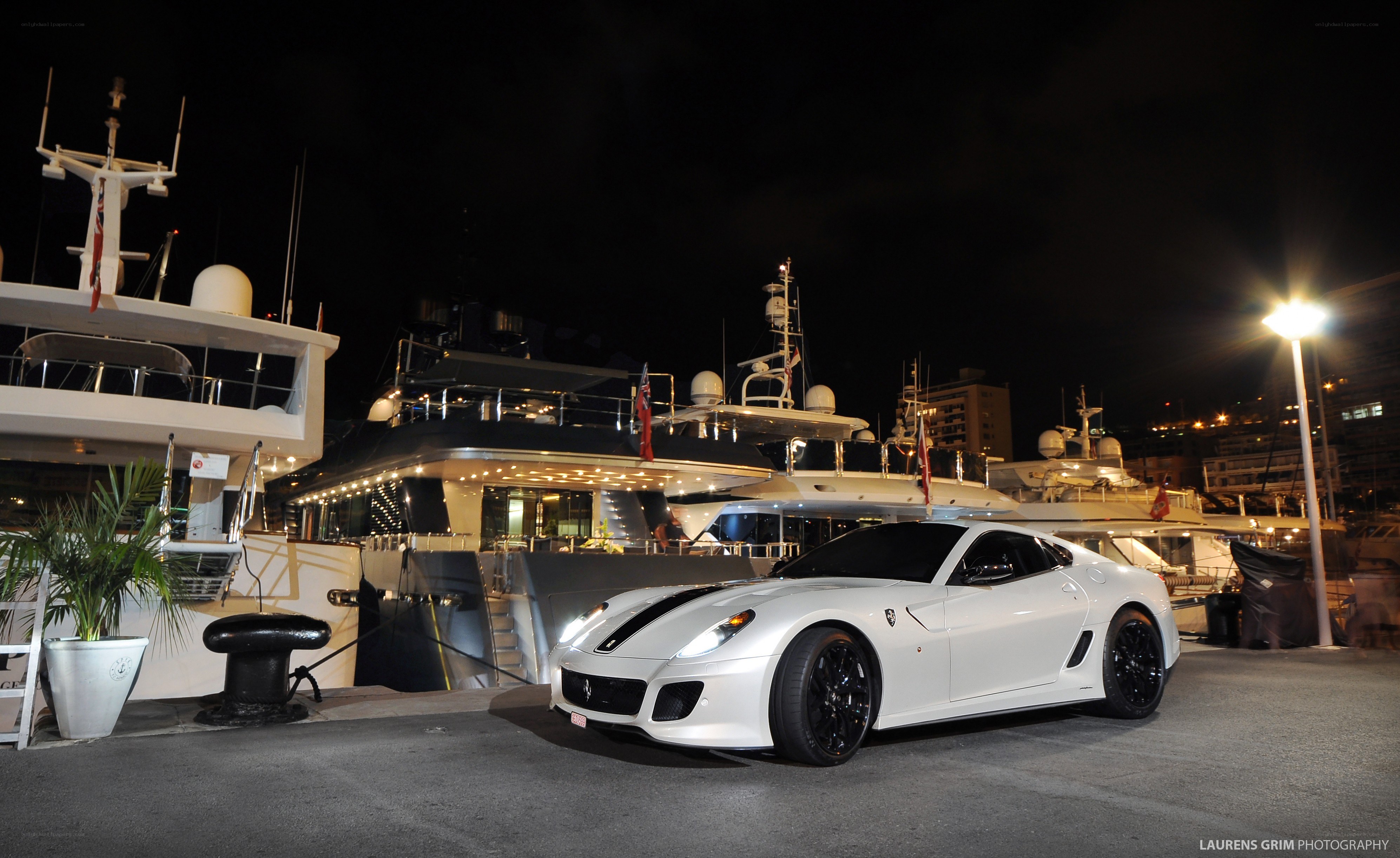 White Ferrari at a marina