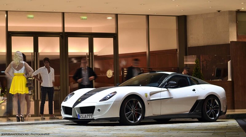 White Ferrari at hotel entrance