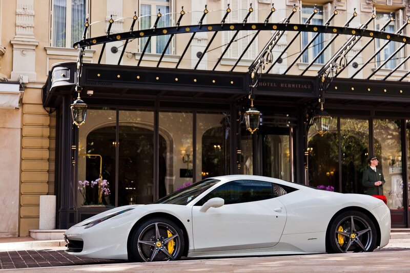 White Ferrari at hotel entrance