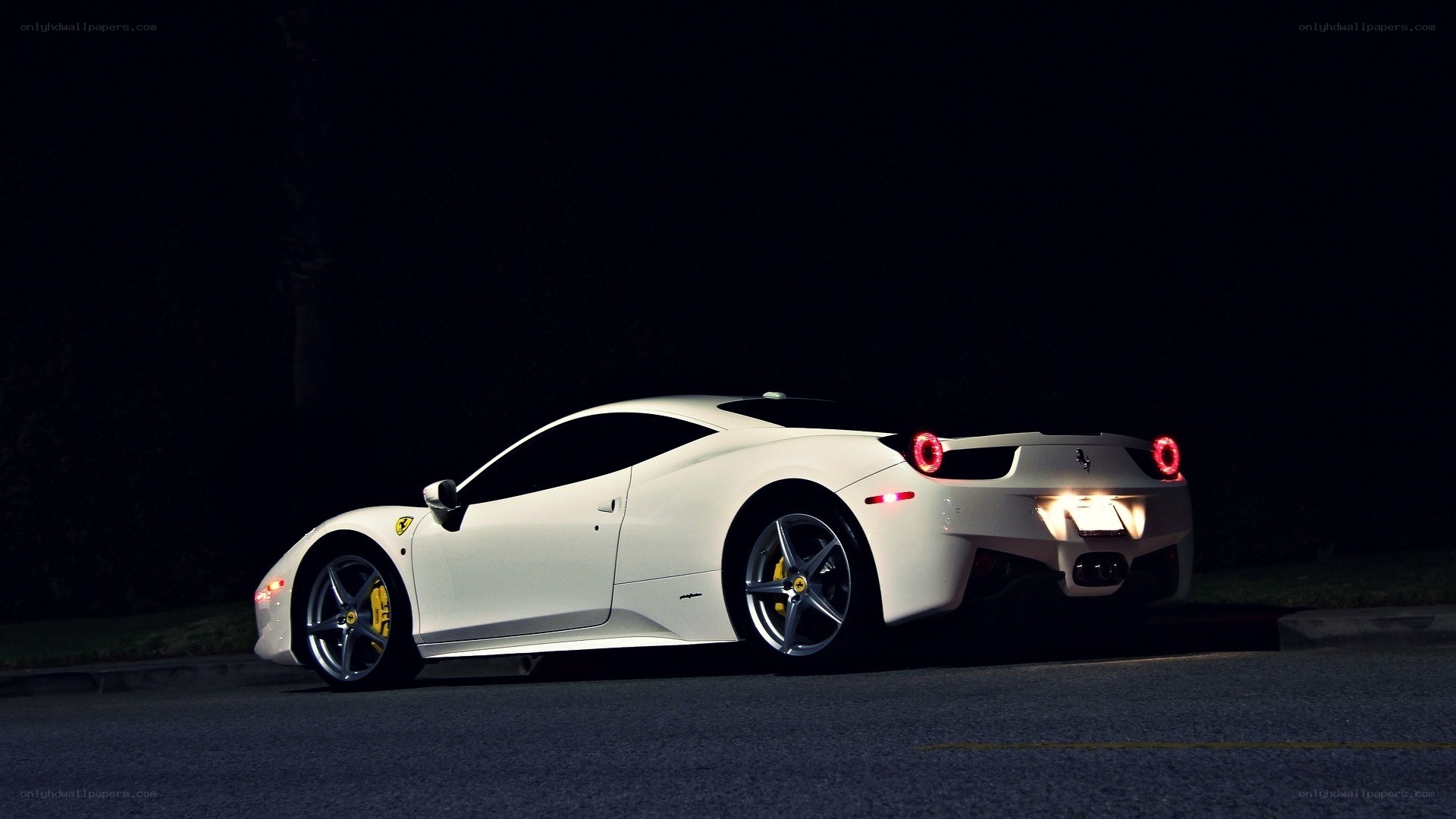 white ferrari at night