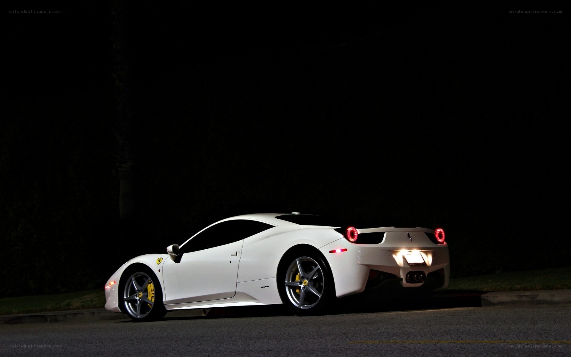 white ferrari at night
