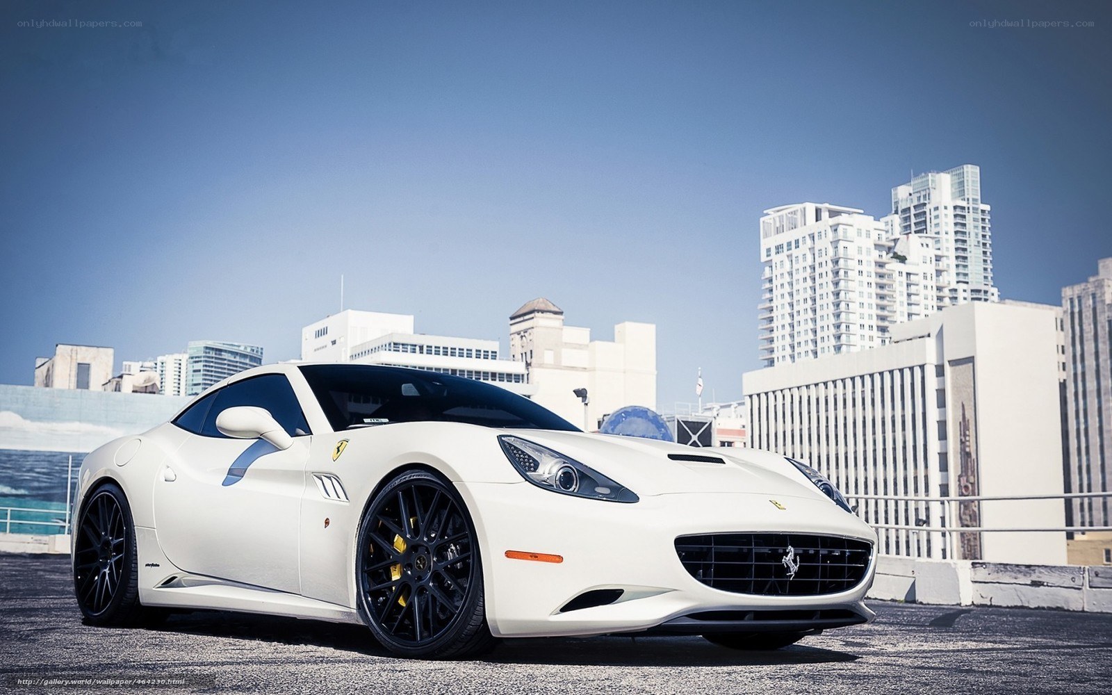 white ferrari car in city